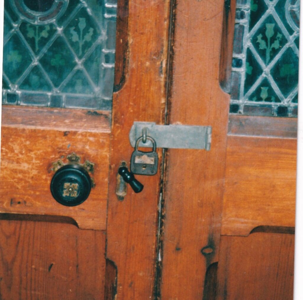 A door with two locks and one key